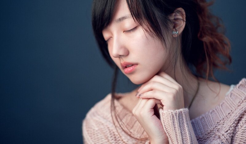 woman in pink sweater