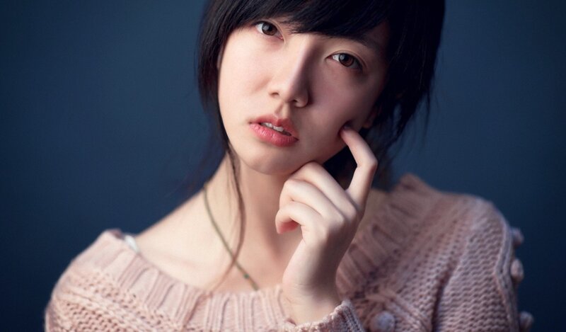 woman in pink sweater