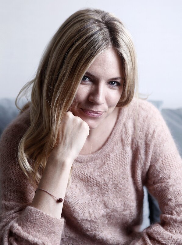 woman in pink sweater
