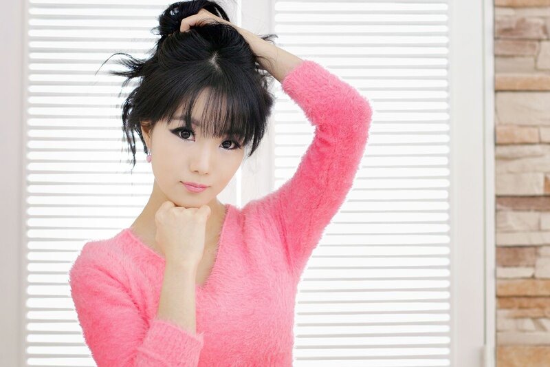 woman in pink sweater