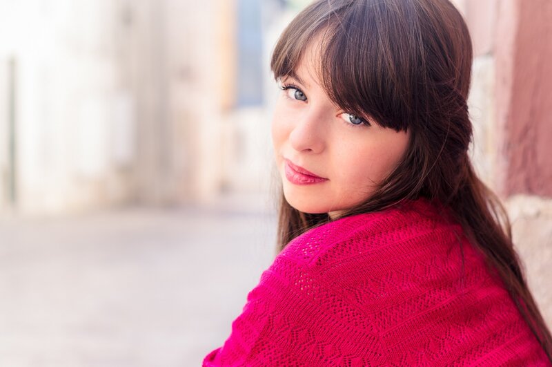 woman in pink sweater
