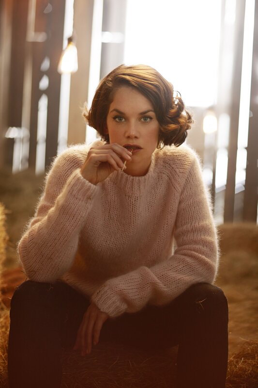 woman in pink sweater