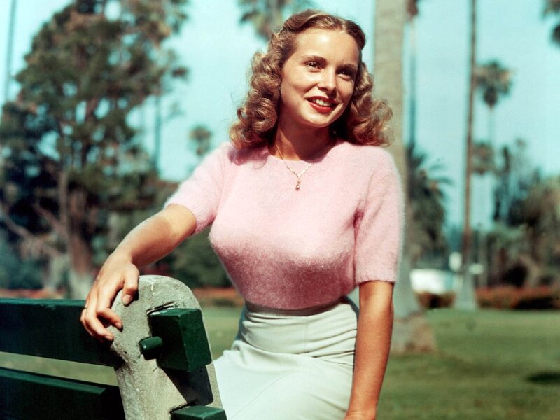 Woman in Pink Sweater — Cheerful