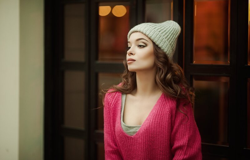 Woman in Pink Sweater — Contemplative, Night