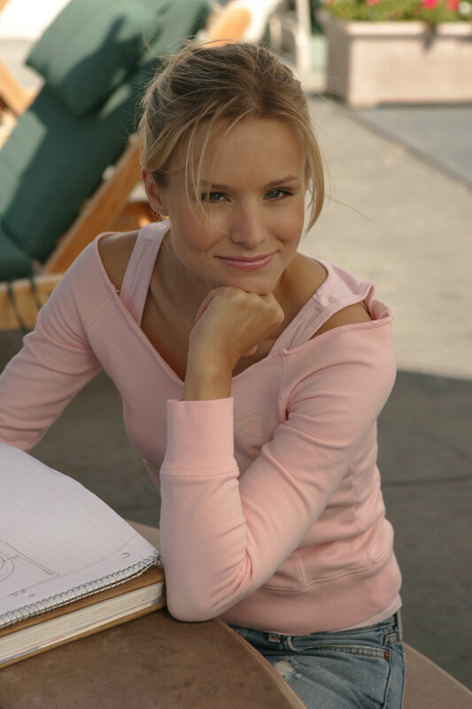 woman in pink sweater smiling