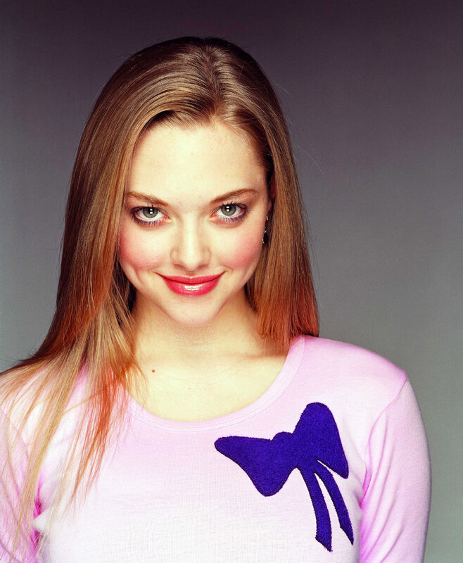 woman in pink sweater with bow