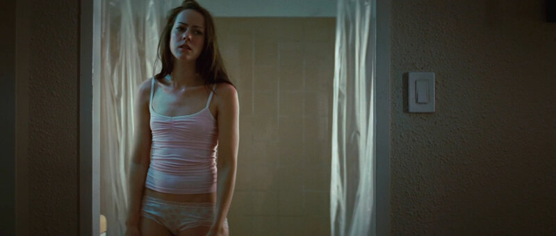 woman in pink tank top
