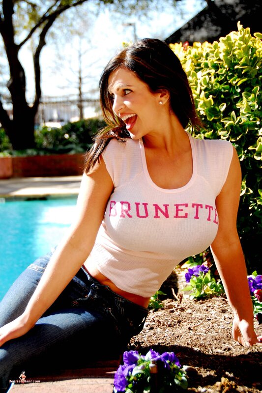 Woman in pink tank top by pool