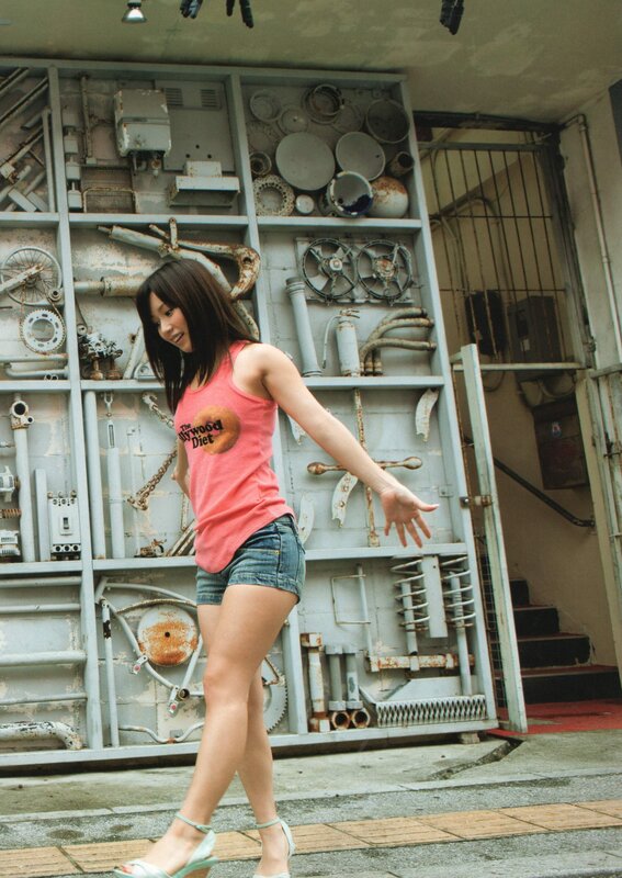 Woman in pink tank top walking