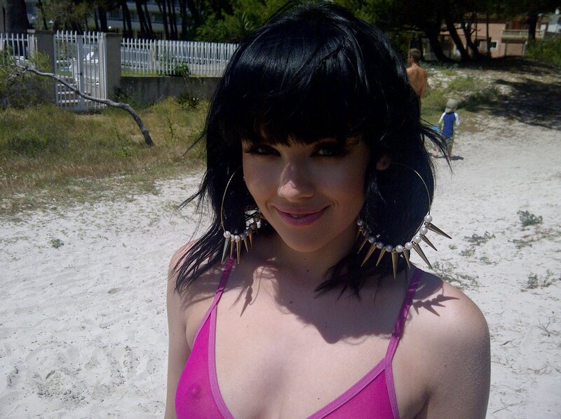 woman in pink top at beach