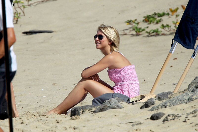 woman in pink top on beach