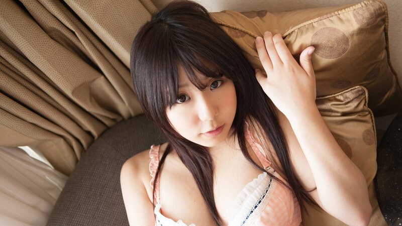 woman in pink top on couch