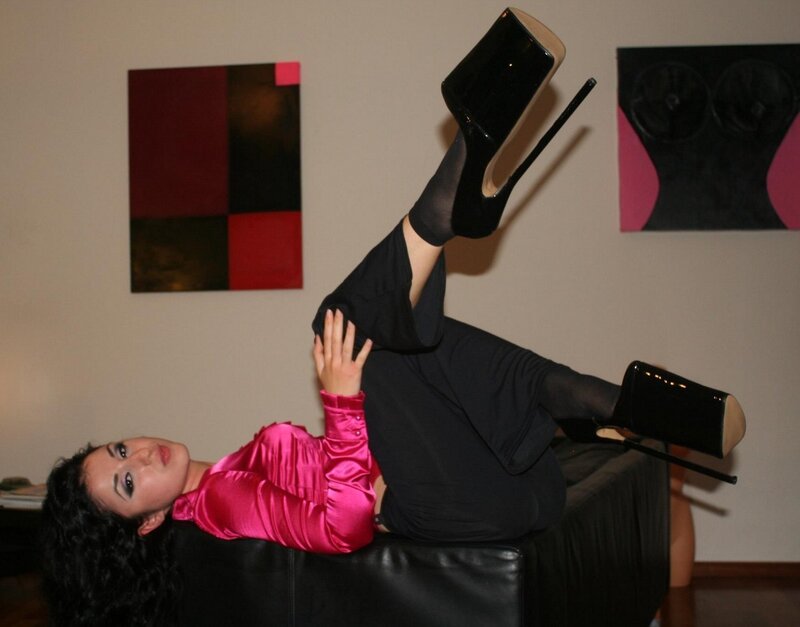 Woman in pink top on couch