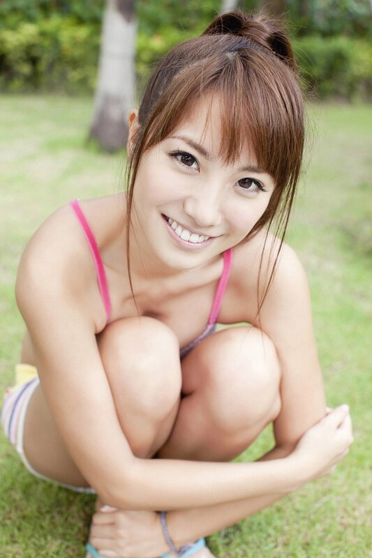 Woman in pink top on grass