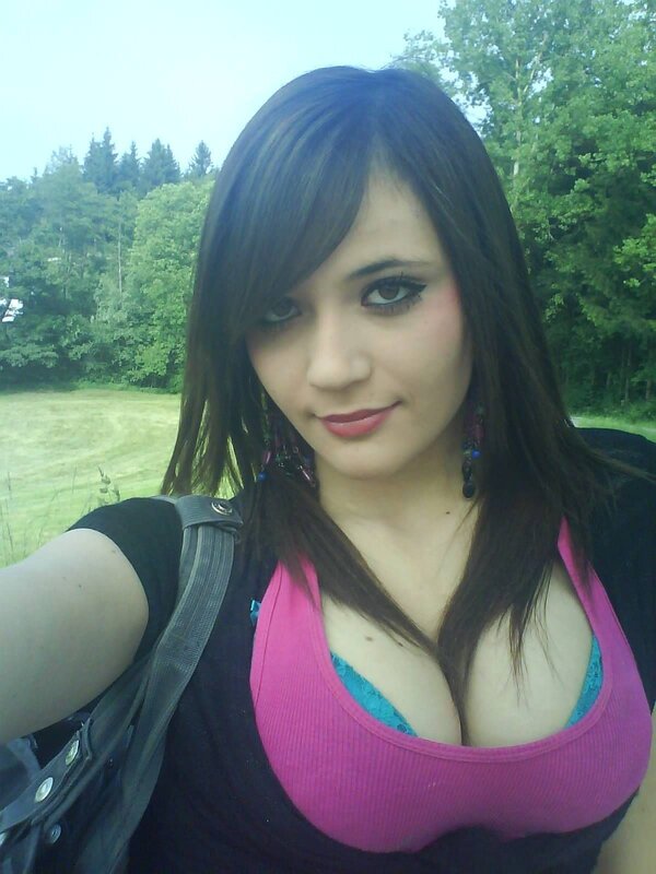 woman in pink top outdoors