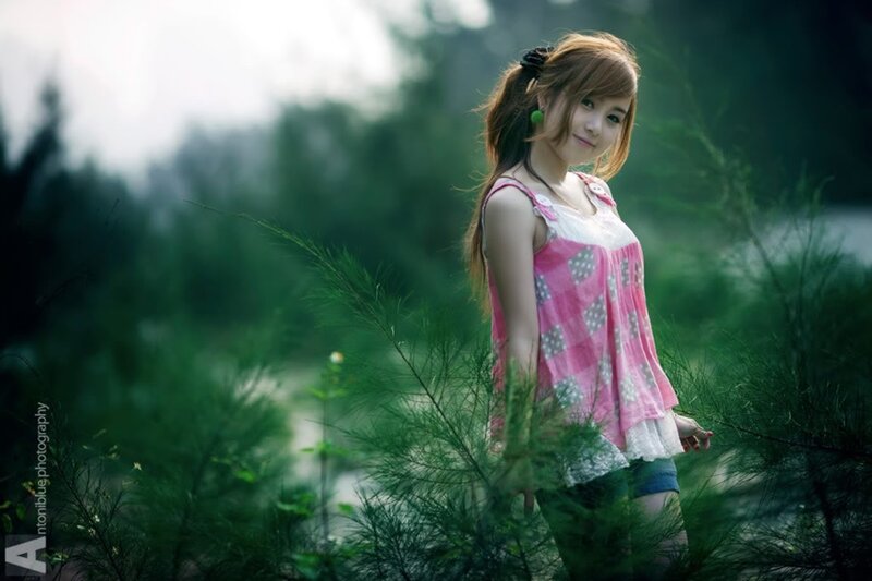 woman in pink top outdoors
