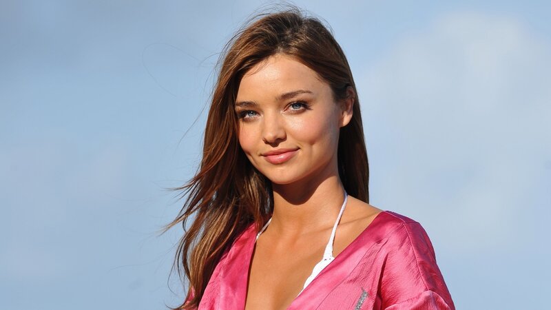woman in pink top outdoors