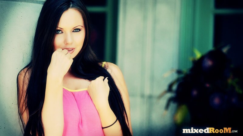 woman in pink top posing