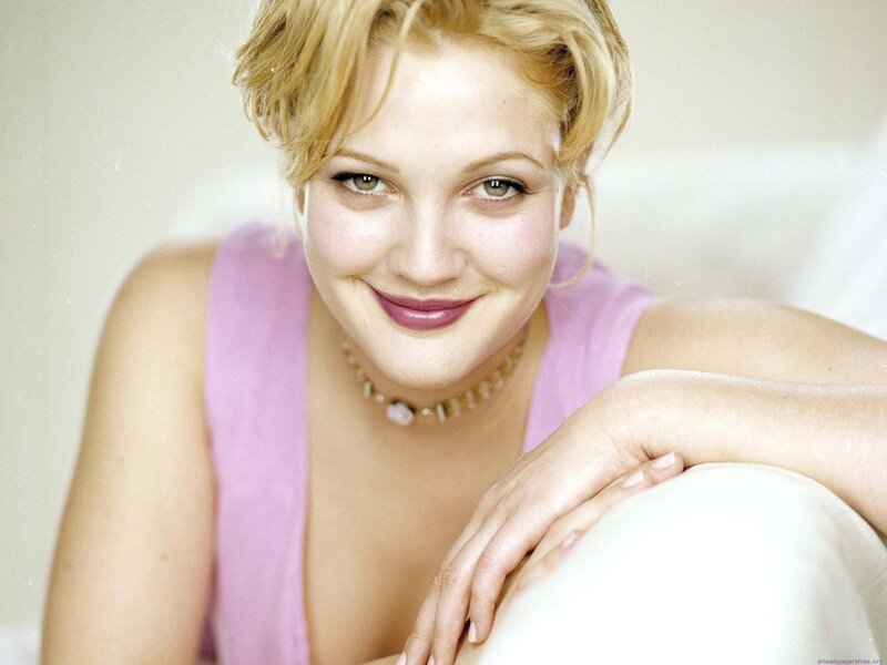 woman in pink top smiling