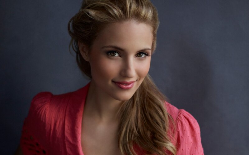 woman in pink top smiling