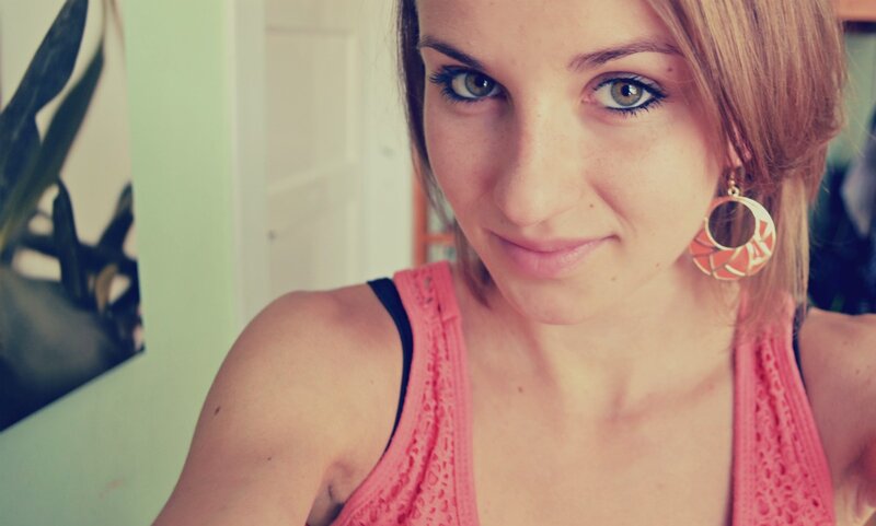 woman in pink top smiling