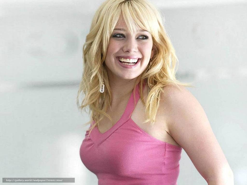 woman in pink top smiling