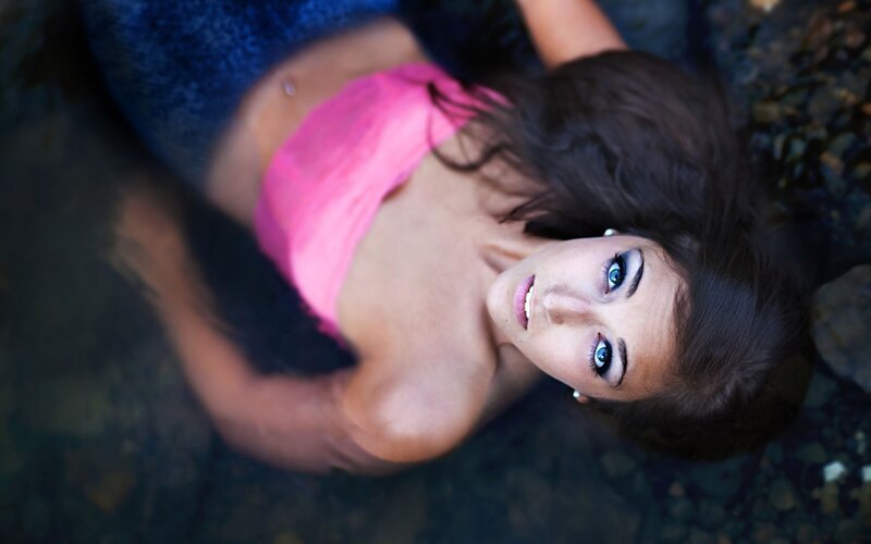 woman in pink top underwater