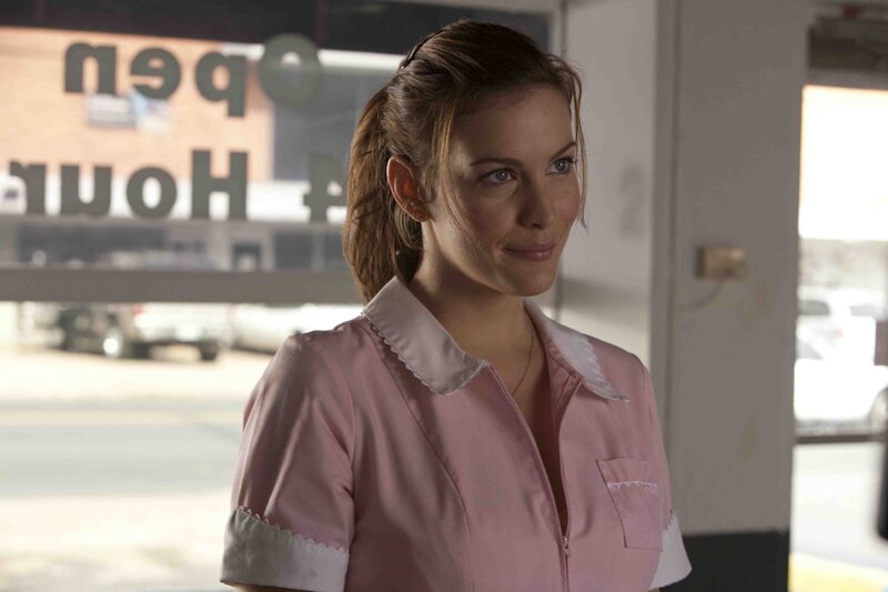 woman in pink uniform