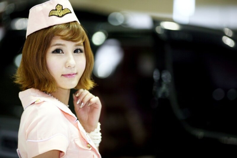 Woman in Pink Uniform — Neutral