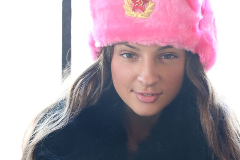 woman in pink ushanka hat