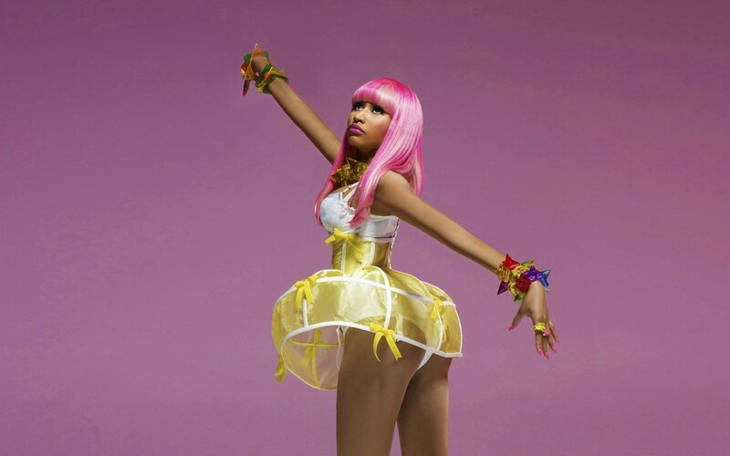 woman in pink wig and yellow dress