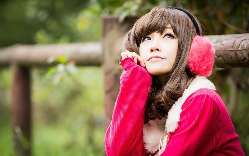 woman in pink winter coat