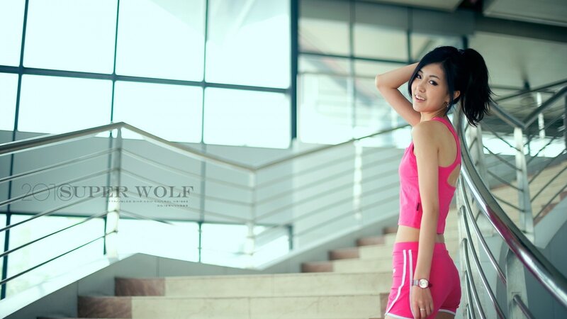 woman in pink workout clothes