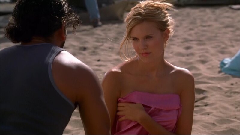 woman in pink wrap on beach