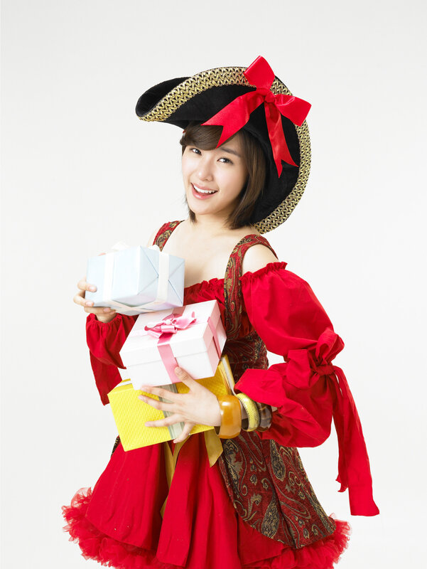 Woman in pirate costume holding gifts