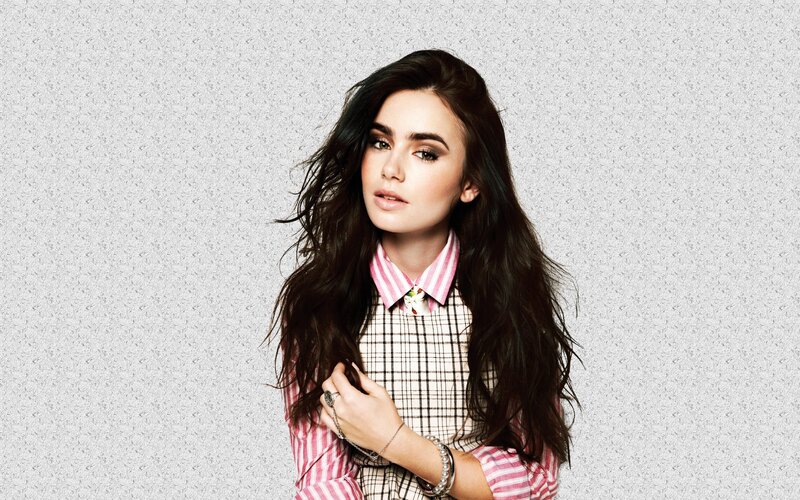 woman in plaid and striped shirt