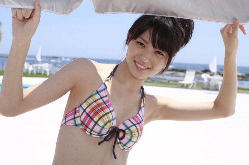 Woman in plaid bikini at beach