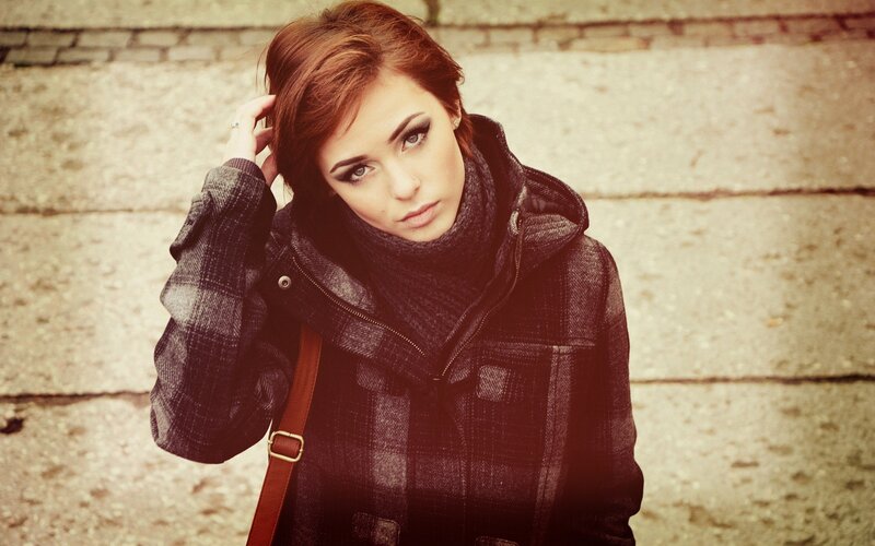 woman in plaid coat