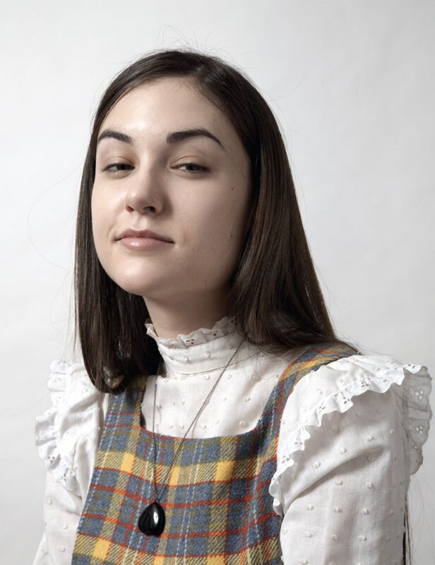woman in plaid dress