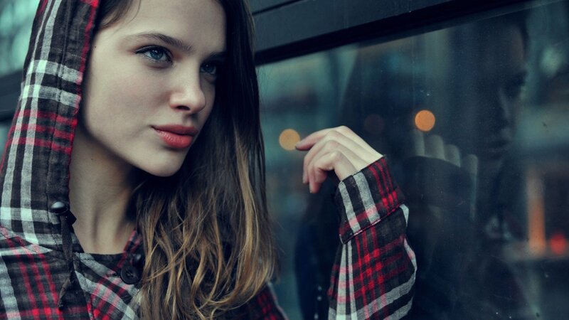Woman in Plaid Hoodie — Red, Contemplative, Night