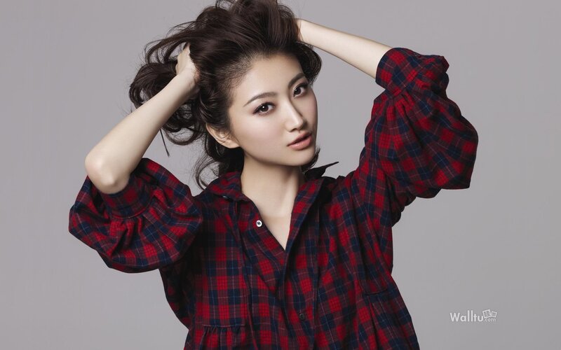 woman in plaid shirt