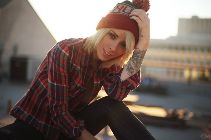 woman in plaid shirt and beanie