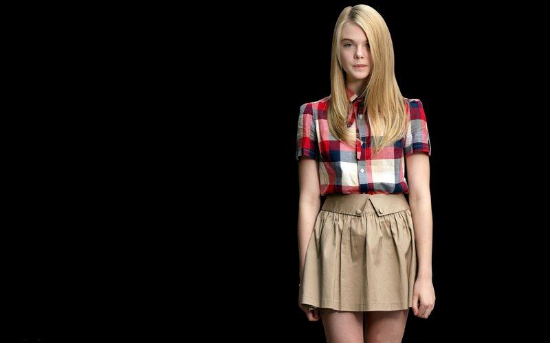 woman in plaid shirt and skirt