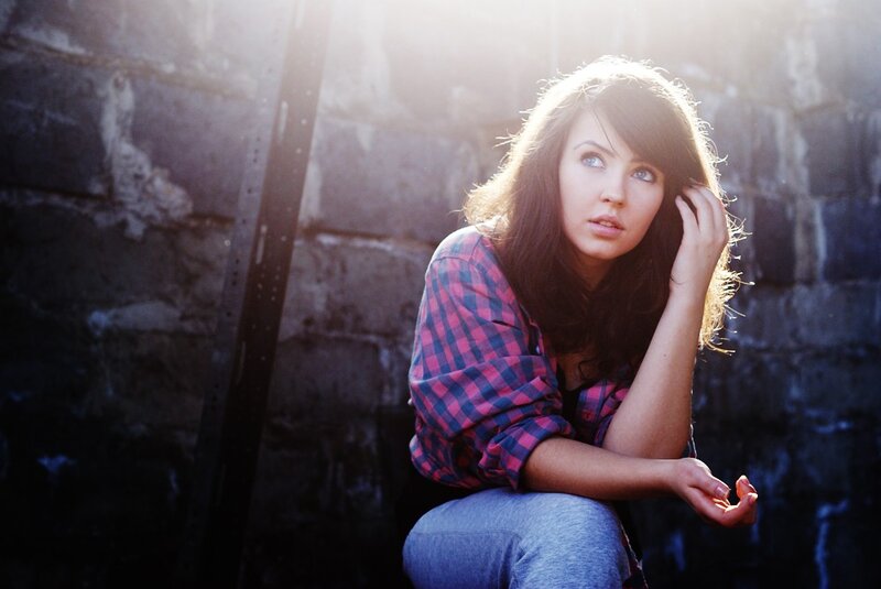 Woman in Plaid Shirt — Blue, Dramatic, Sunset, Photograph, Brick Wall