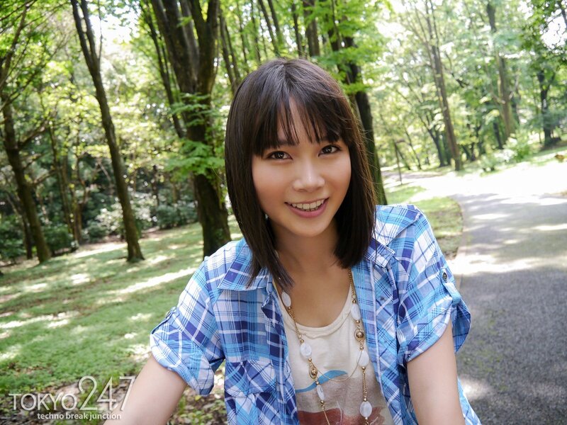 Woman in Plaid Shirt — Blue, Serene, Afternoon