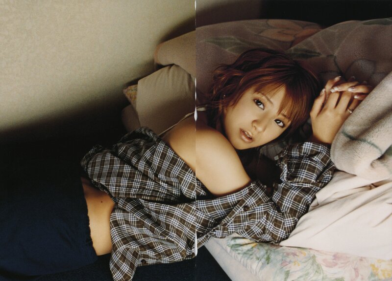 woman in plaid shirt lying down