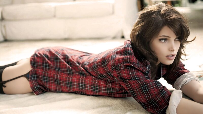 woman in plaid shirt lying down
