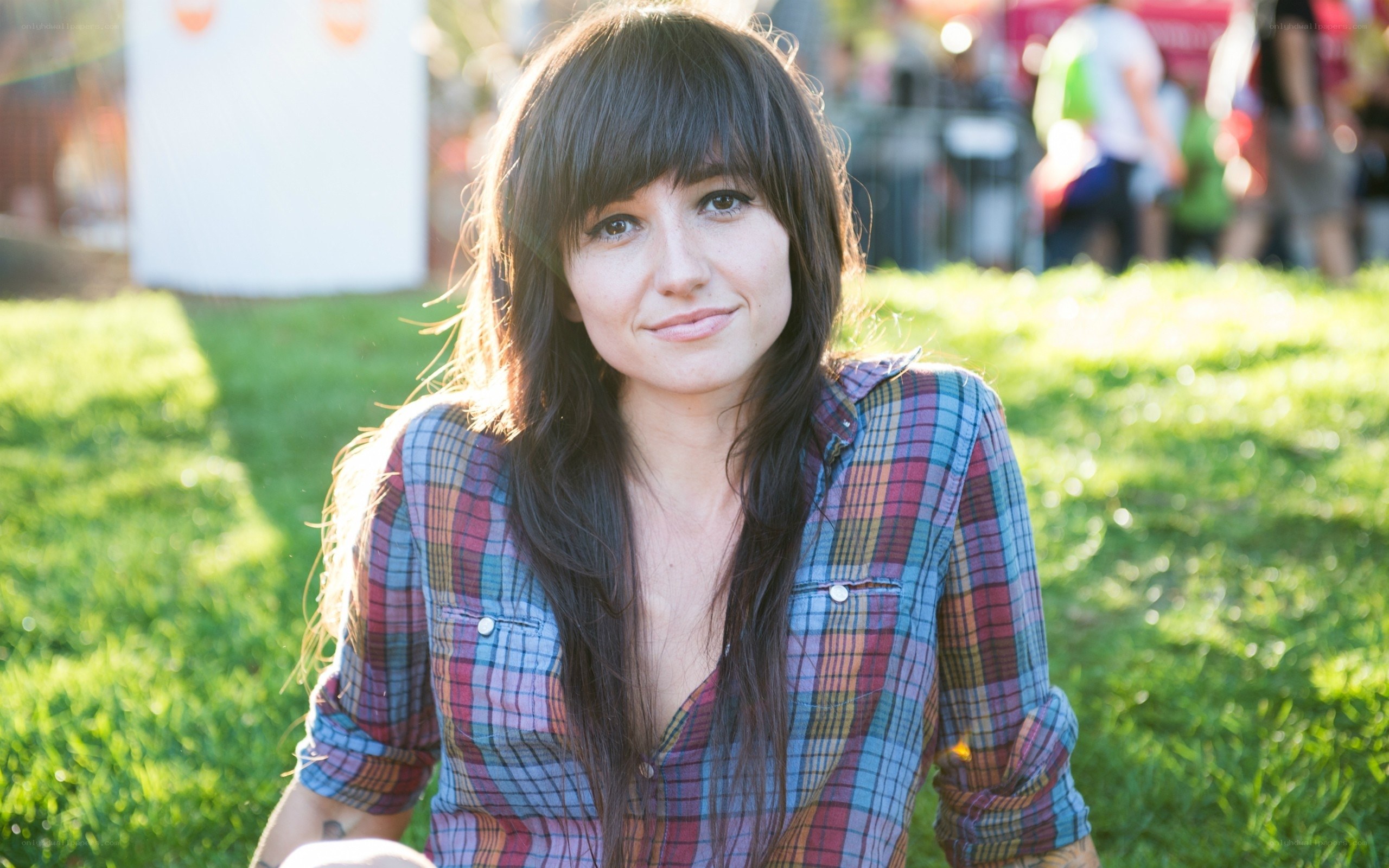 woman in plaid shirt outdoors
