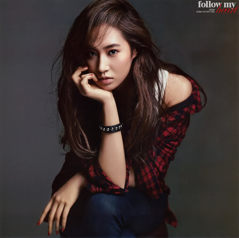 woman in plaid shirt posing