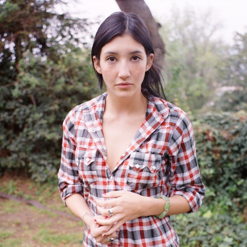Woman in Plaid Shirt — Red, Calm, Photograph